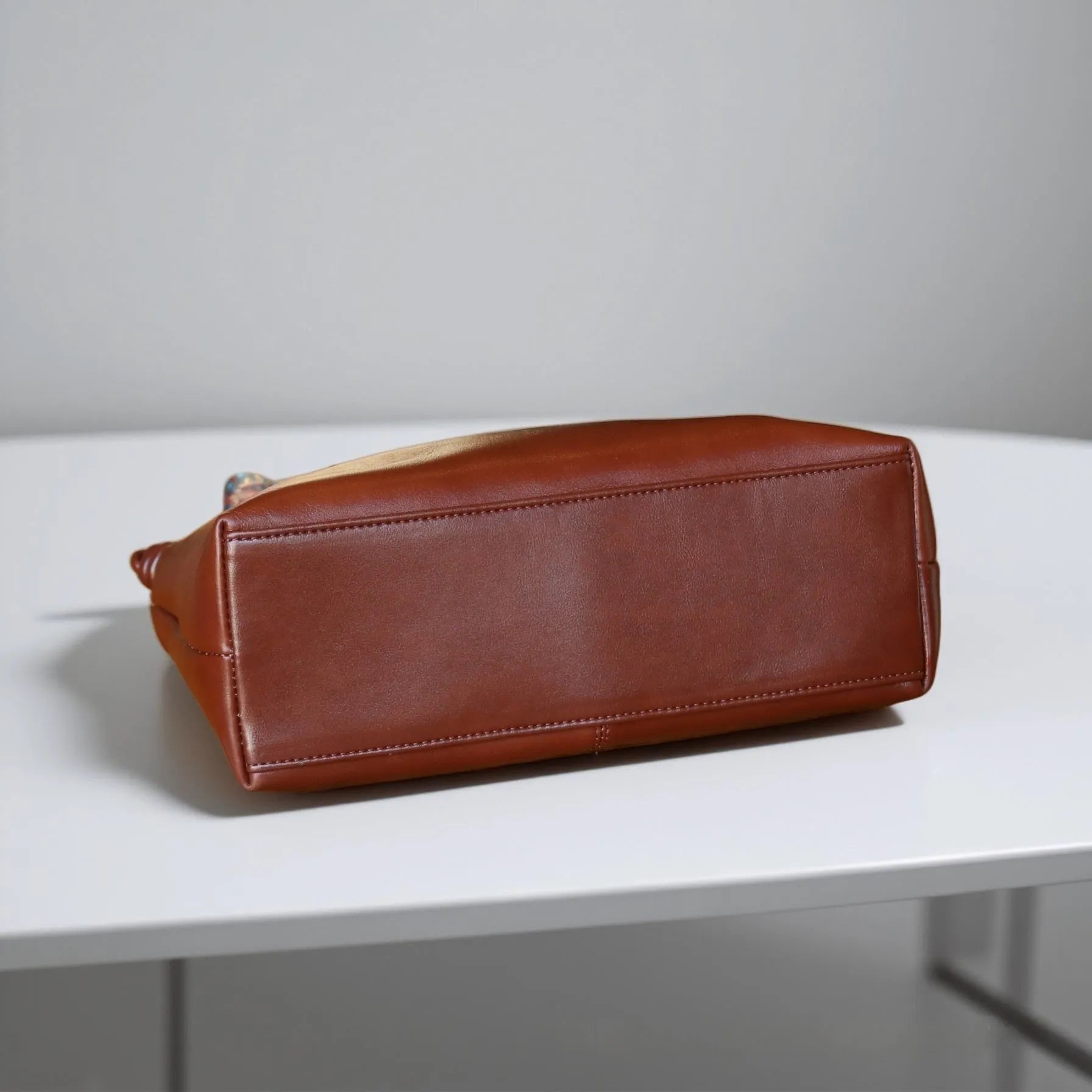Genuine leather hand shoulder bag in caramel colour, pillow shape, top grain leather, 31x11x24cm