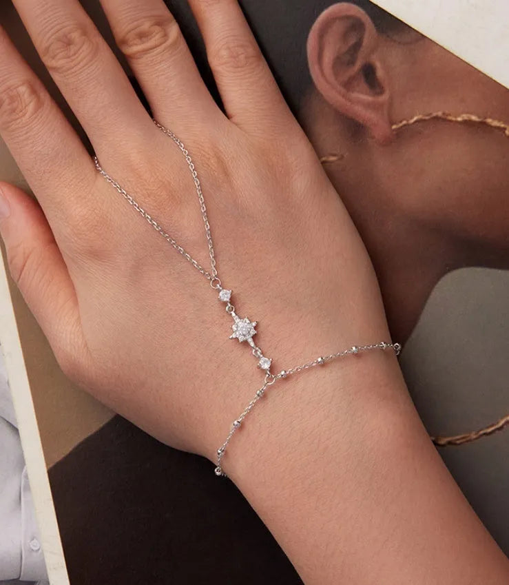 S925 sterling silver integrated ring and bracelet set with eight-pointed star ornament on white background