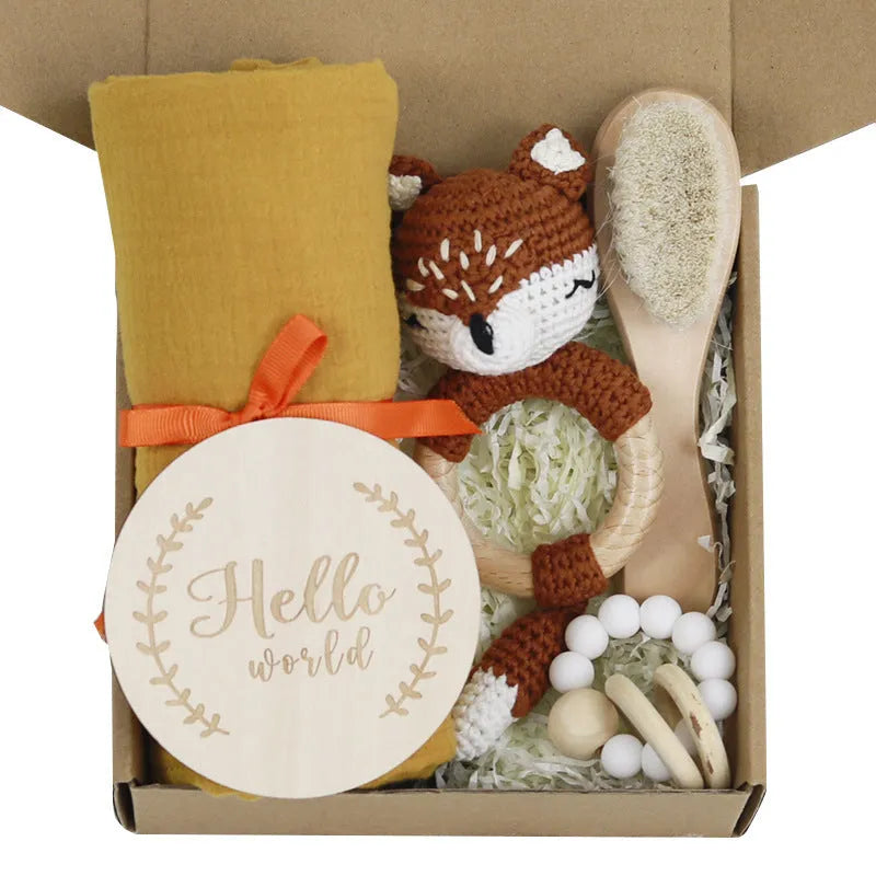 Baby teething toy gift set with bamboo cotton blanket and natural beech wood components
