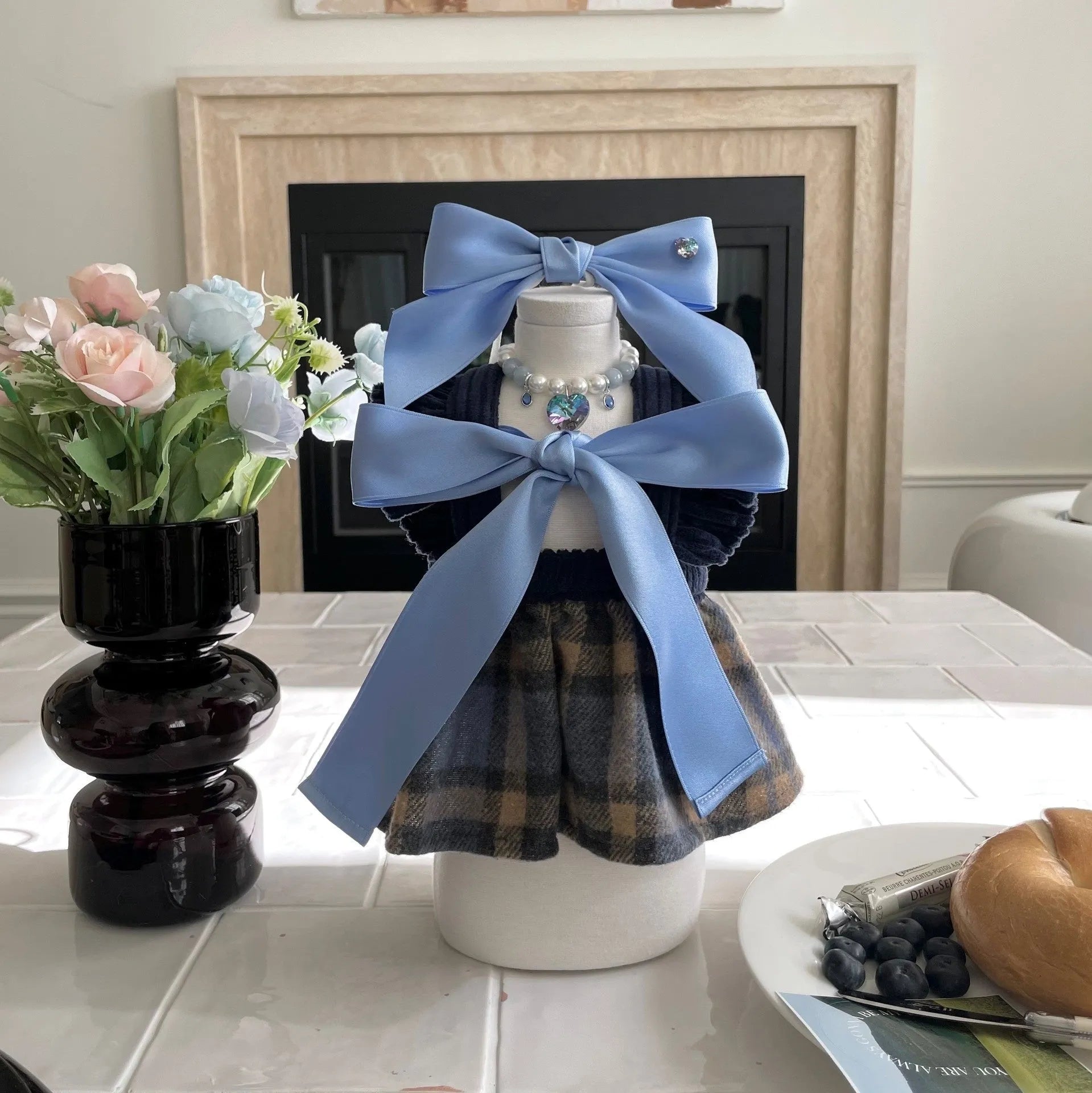 Princess style adjustable bow dog headband in blue colour on small dog