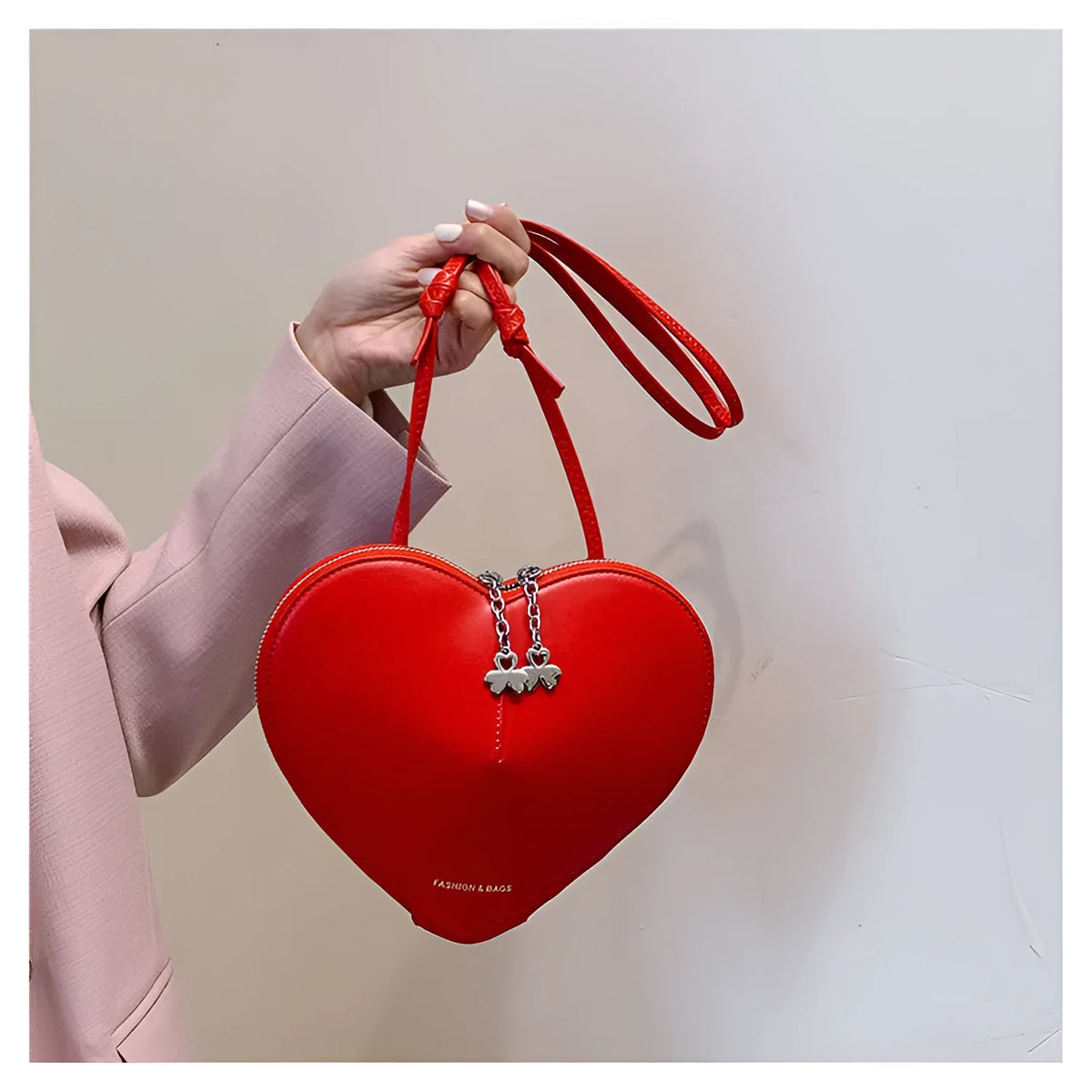 Women's heart-shaped PU crossbody bag in milky white with single shoulder strap and sandwich pocket