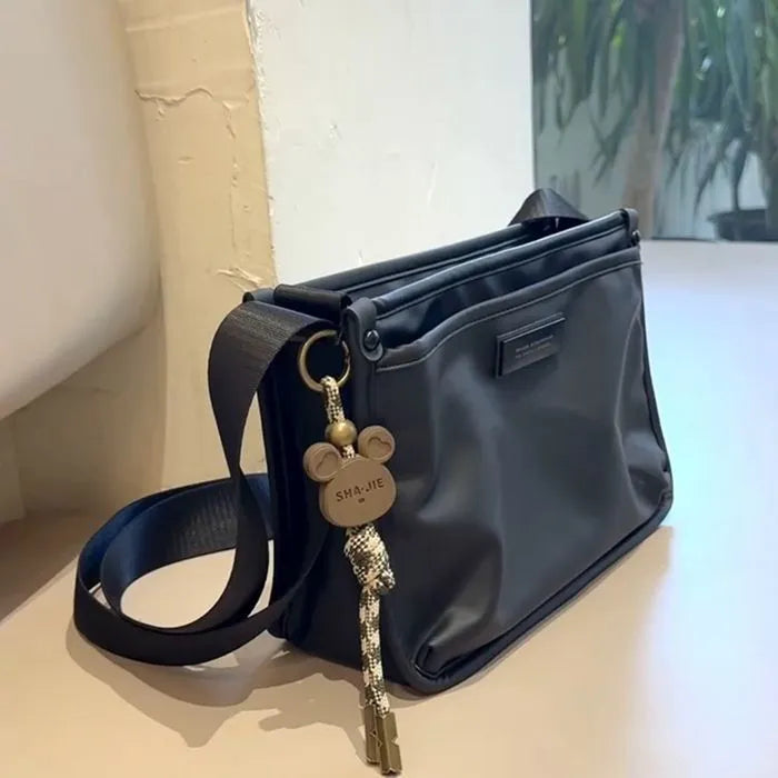 Small square Oxford cloth crossbody bag in trendy cool colour for street style leisure travel