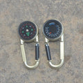 Army green zinc alloy outdoor carabiner with built-in fluid compass and liquid thermometer showing temperature scale