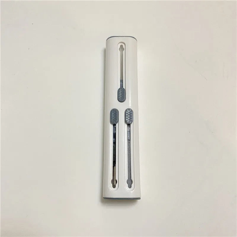 AirPods Pro cleaning kit with double-headed brush showing four cleaning attachments for electronics
