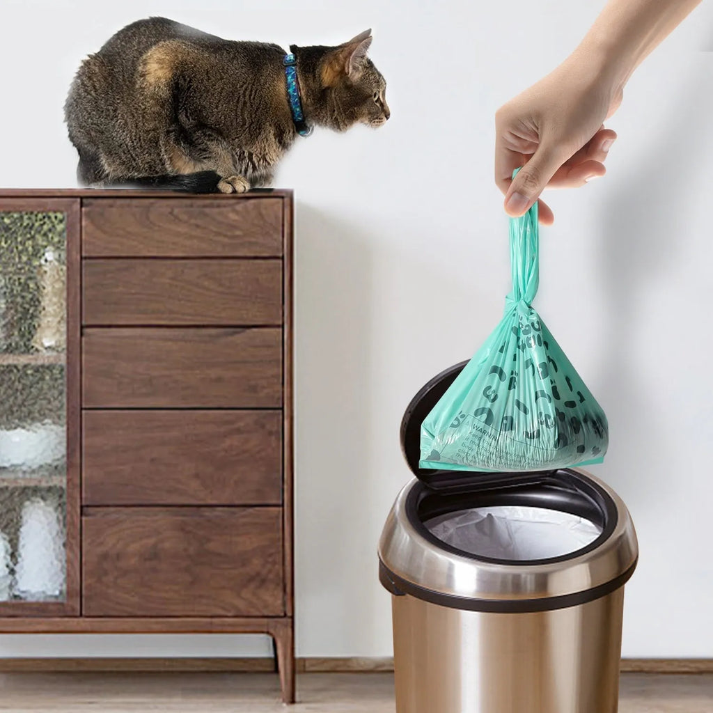 Blue deodorising cat litter bags for poop disposal with shovel compatibility, simple home style