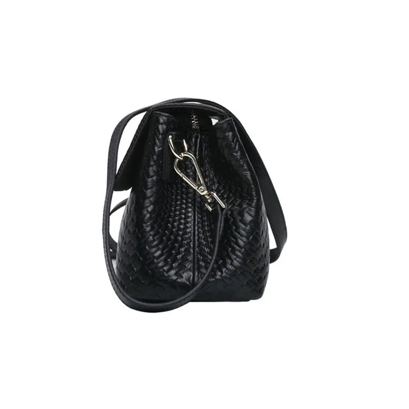 Genuine leather women's woven crossbody bag in black with embossed finish and soft handle