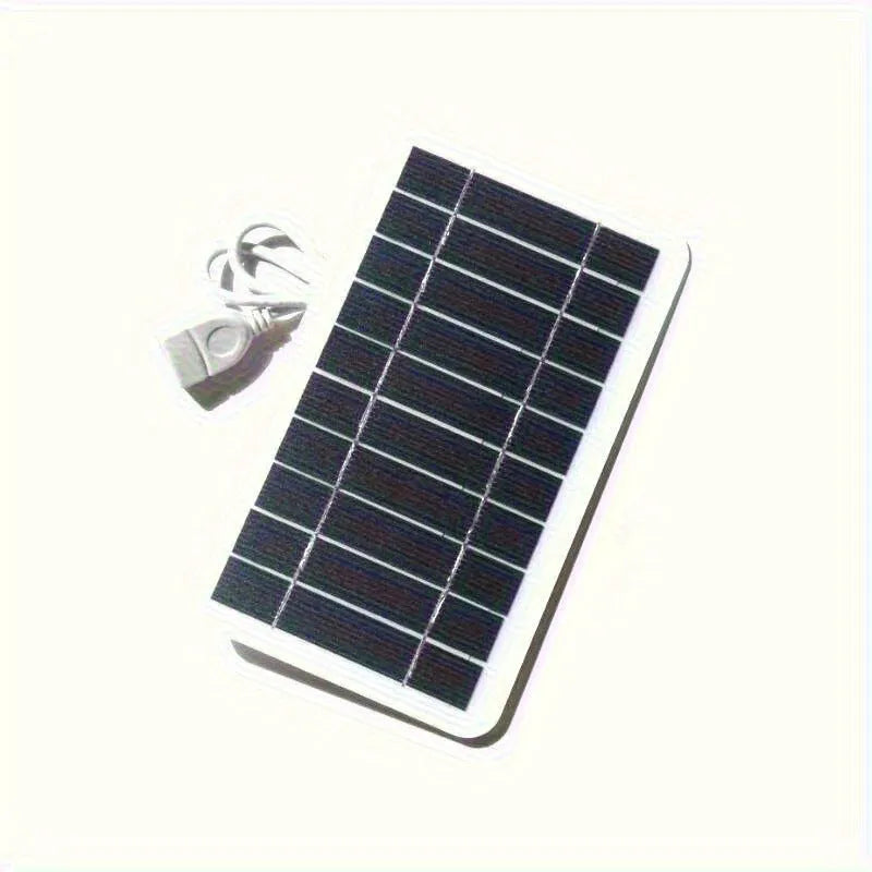 Compact 157x94mm PET solar panel charger with USB cable for device charging