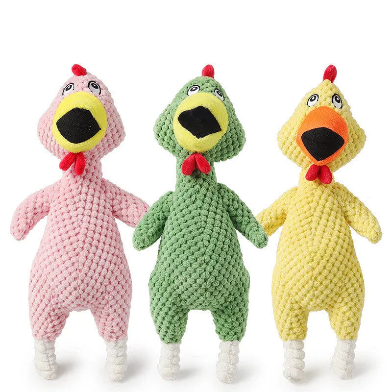 Pink pineapple velvet screaming chicken dog toy with squeaker, 35cm long, on white background