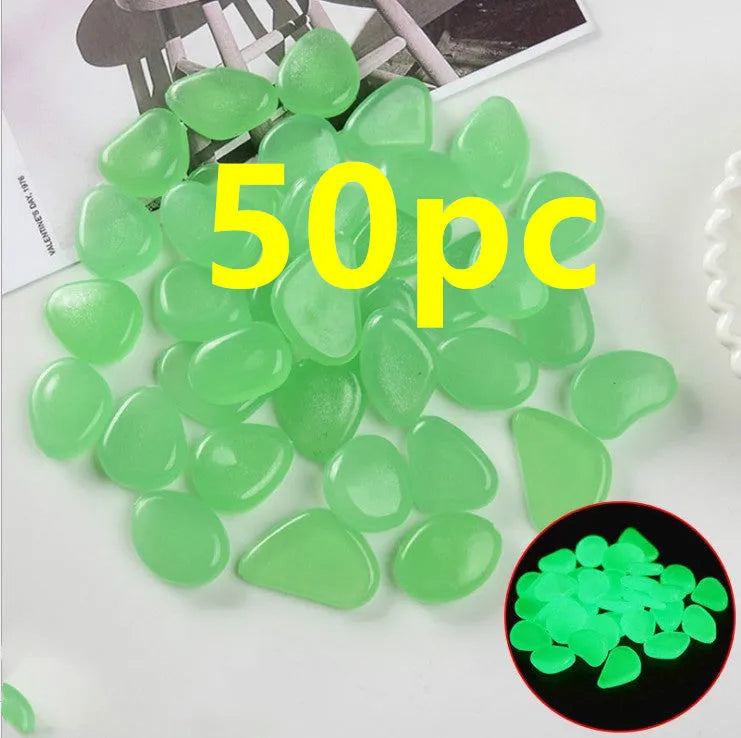 Luminous fluorescent aquarium and garden pebbles in mixed colours including dark purple, yellow, light blue, pink, orange