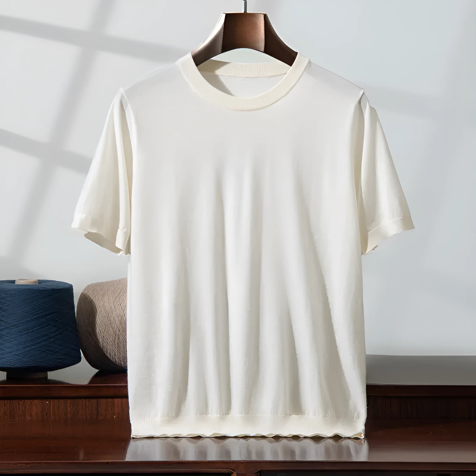 Men's loose-fit knitted casual short sleeve shirt in a choice of eight colours including black, blue, and grey.