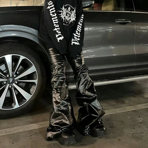 Black coated patent leather skinny jeans with straight leg cut and mid waist design