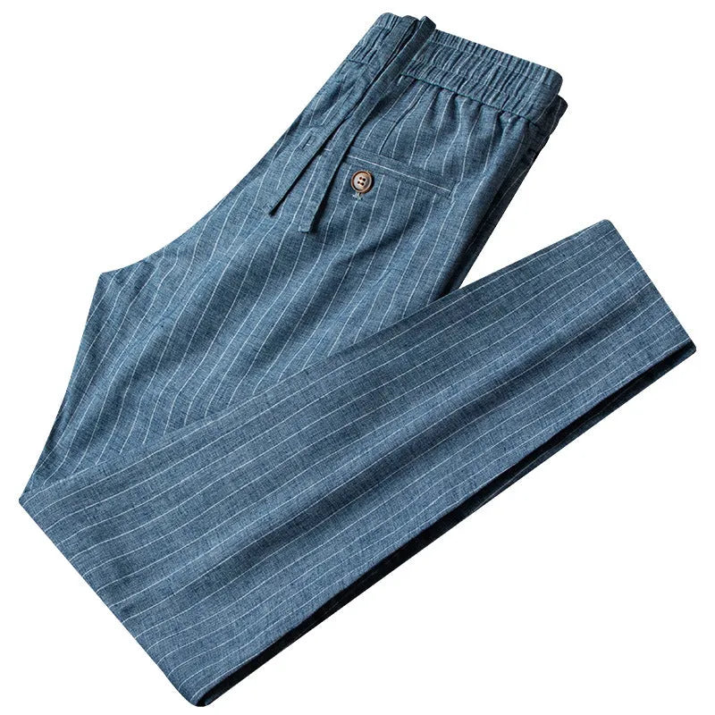 Men's casual linen striped trousers in blue gray, showing elasticated waist and straight leg