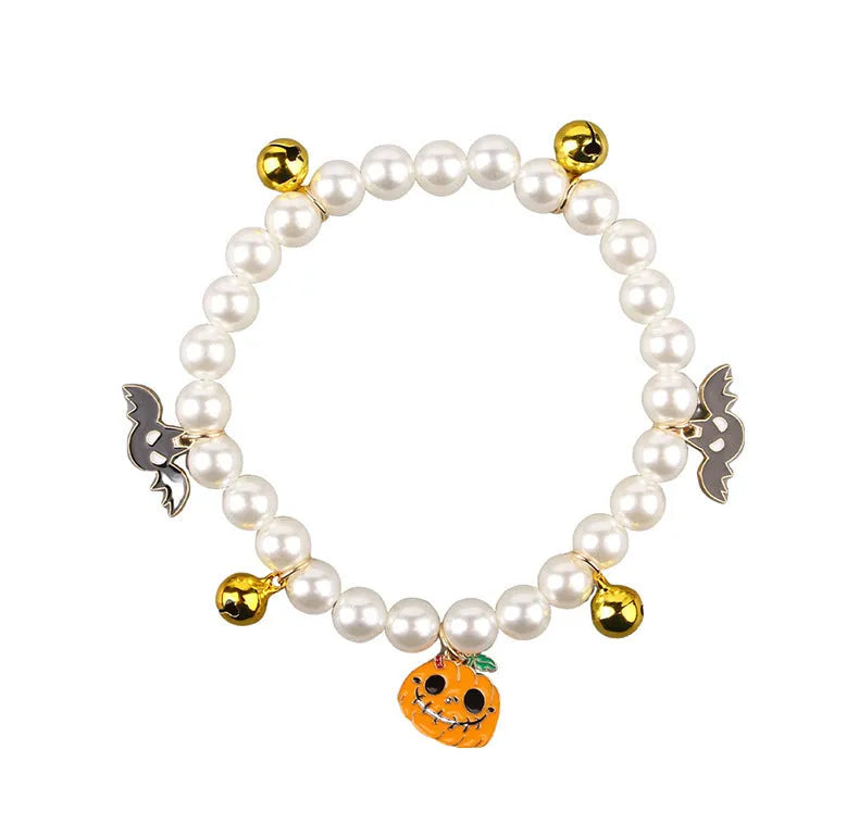 Halloween cat collar with simulated pearl necklace design showing pumpkin pattern variations