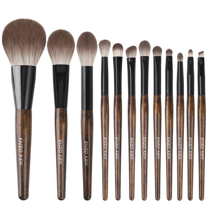 12 piece makeup brush set with wooden handles in a portable PU carry bag