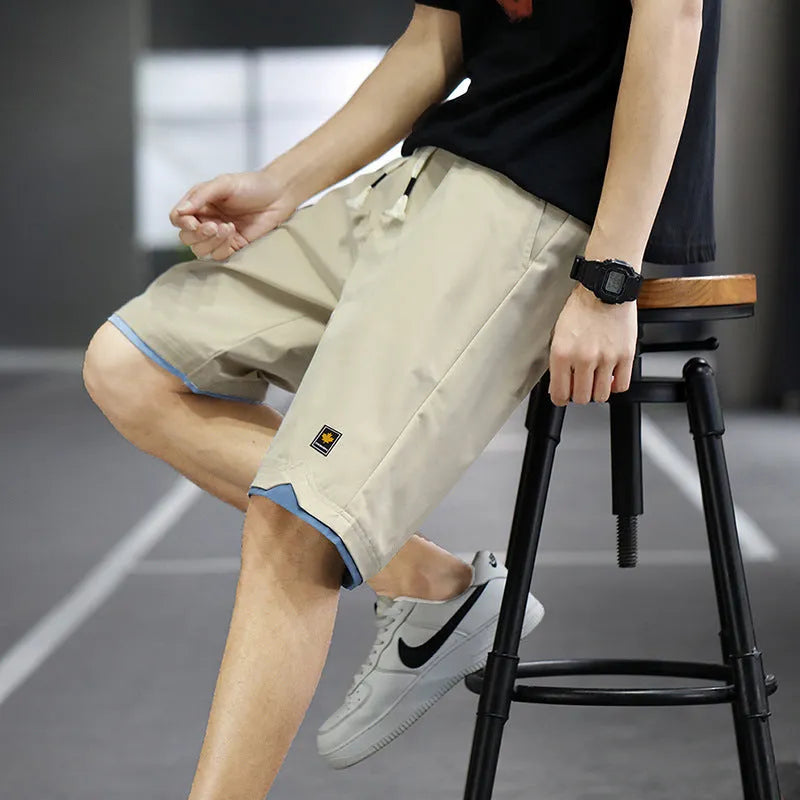 Straight loose casual beach shorts in micro-elastic polyester fabric available in multiple colours
