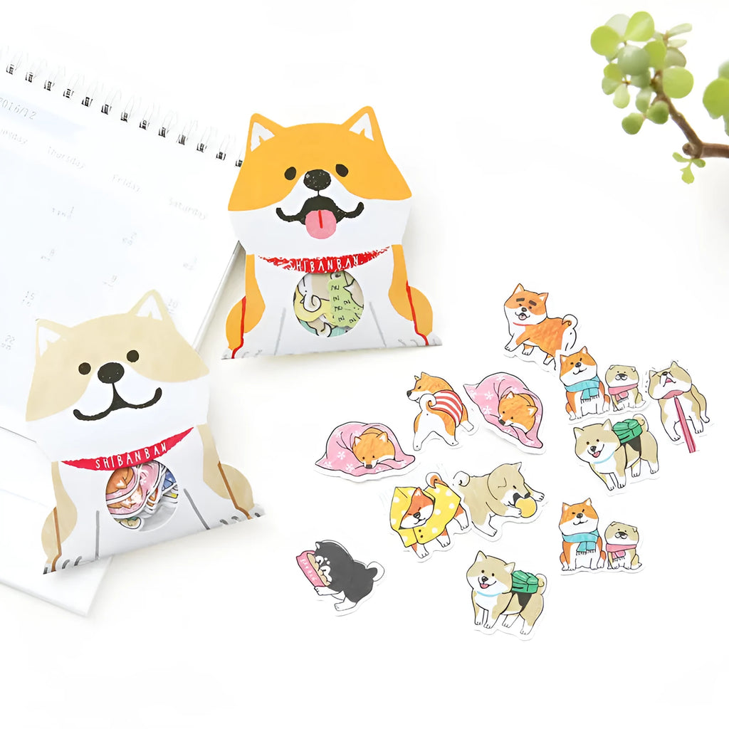 Pack of irregular-shaped dog-themed stickers in black, light brown, and orange colours for journal decoration.