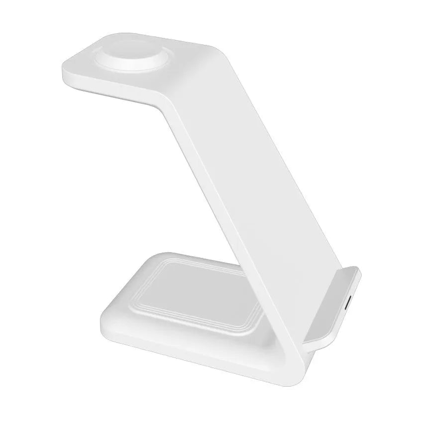 White 3-in-1 upright wireless charger and phone holder on a desk with a mobile phone charging.