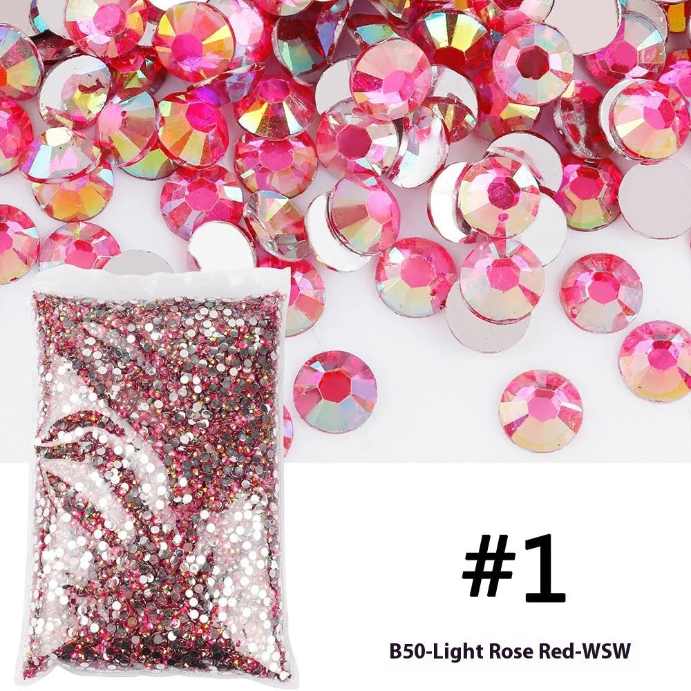 Plastic resin nail art rhinestones in multiple colours with electroplated surfaces arranged in mesh packaging