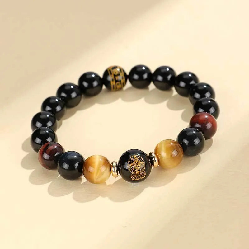 Handmade black agate beaded bracelet with Buddhist carving and tiger eye gemstones