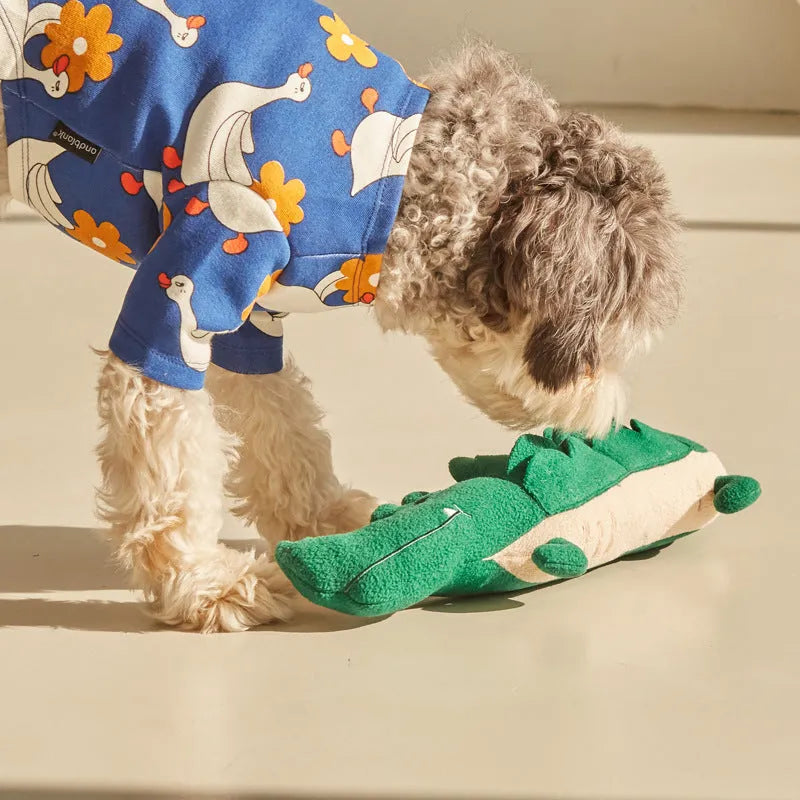 Green plush toy dog soft toy measuring 35cm long on a white background.