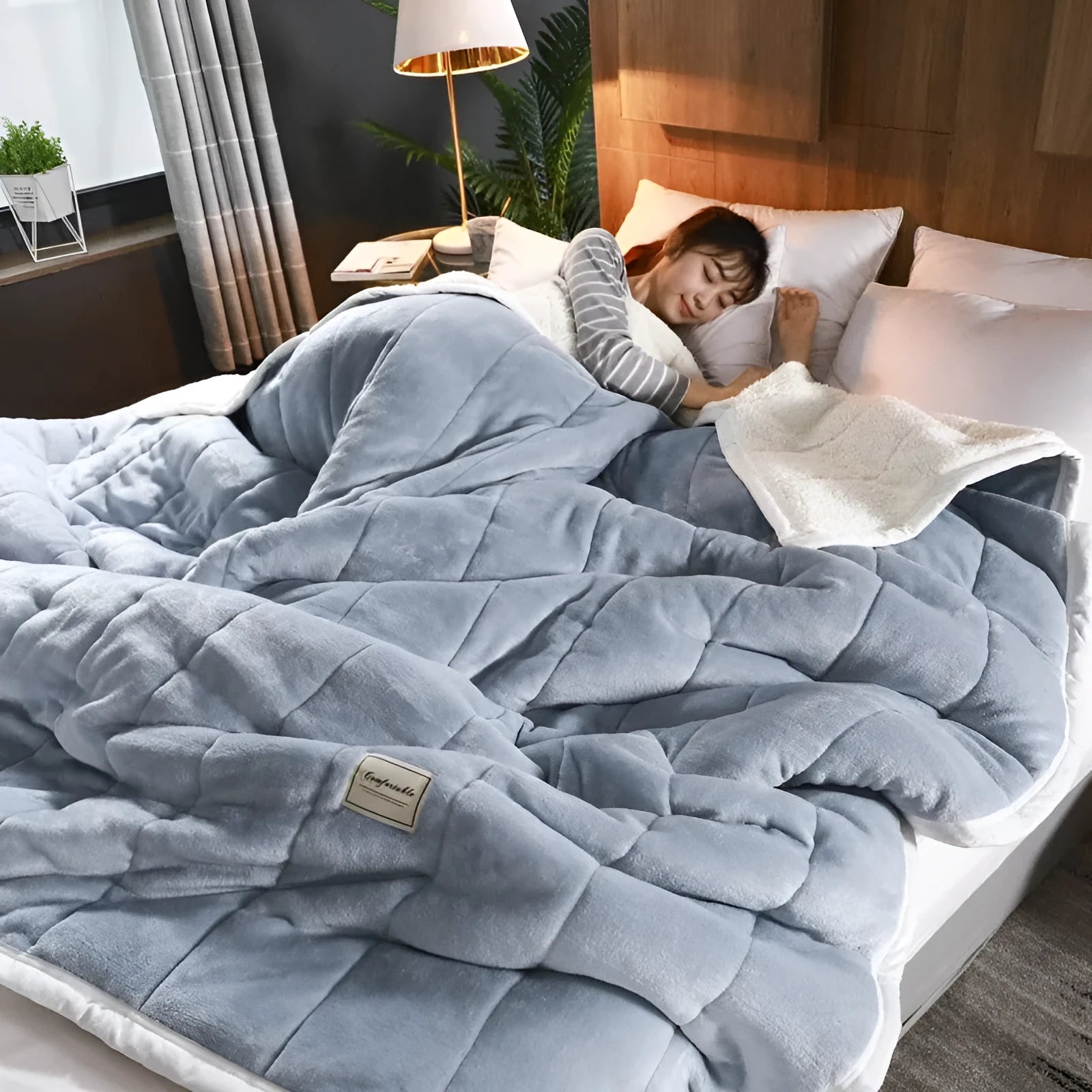 Avocado green coral fleece blanket folded to show its thick texture and 150x200cm size.