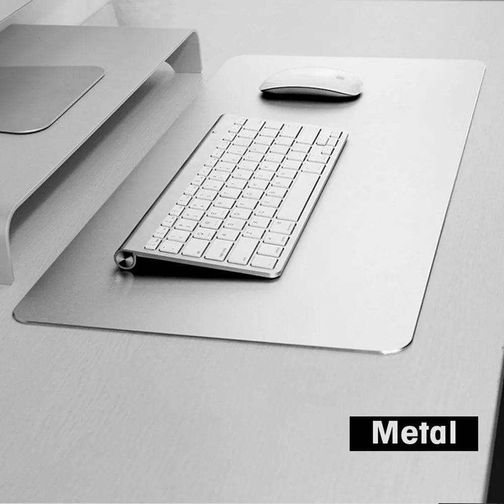 Aluminium alloy double-sided mouse pad in black finish on a desk for gaming or office use