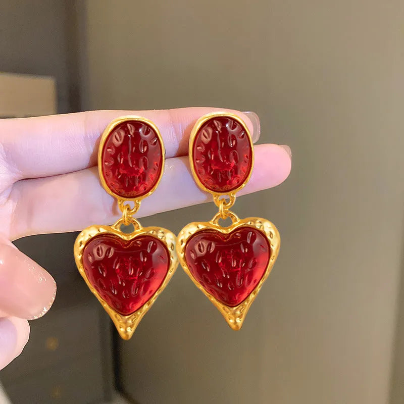 Pleated oval love heart stud earrings in purple, red, green, and yellow white colours with butterfly backs