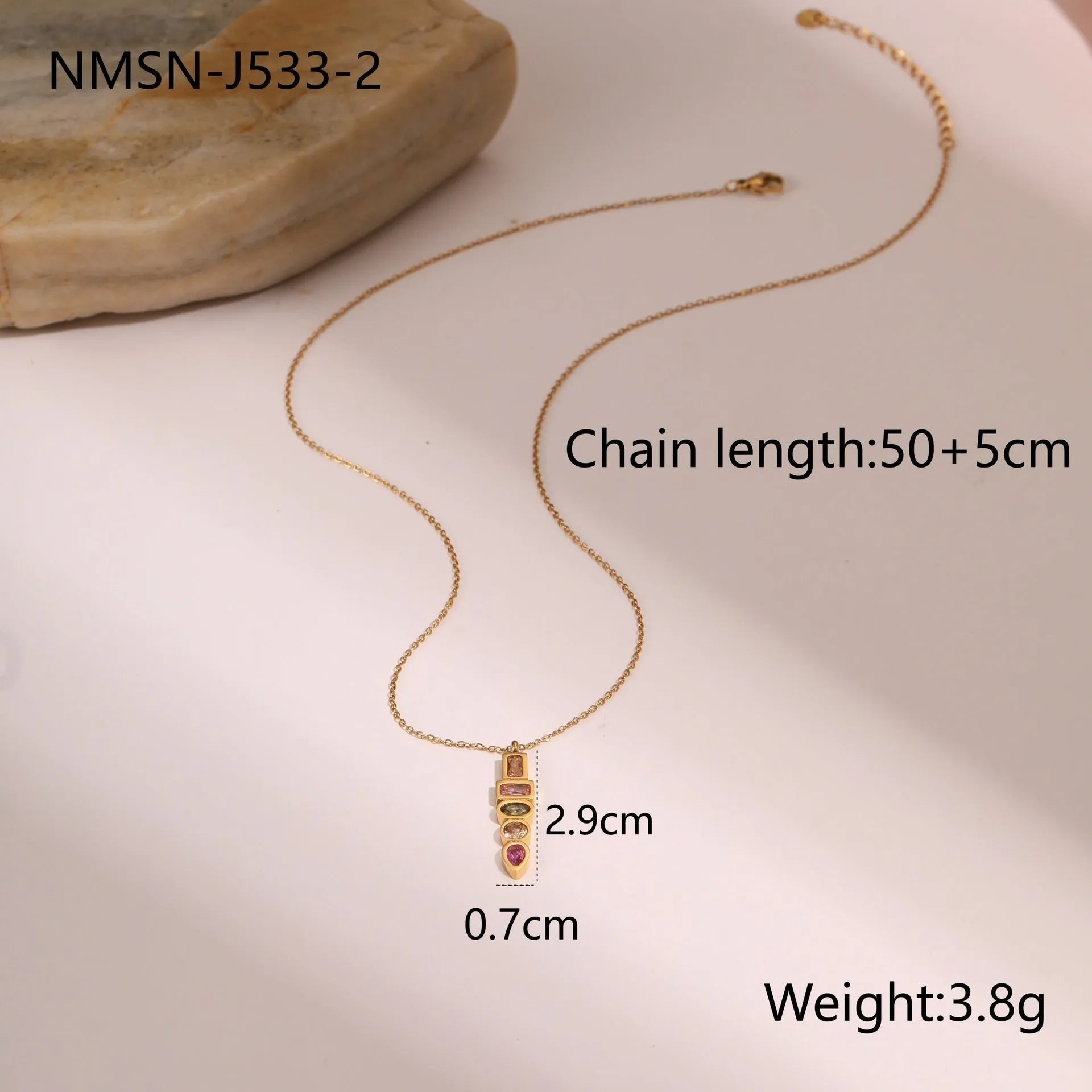 Geometric gold plated jewellery set with necklace, ring, and earrings featuring zircon elements