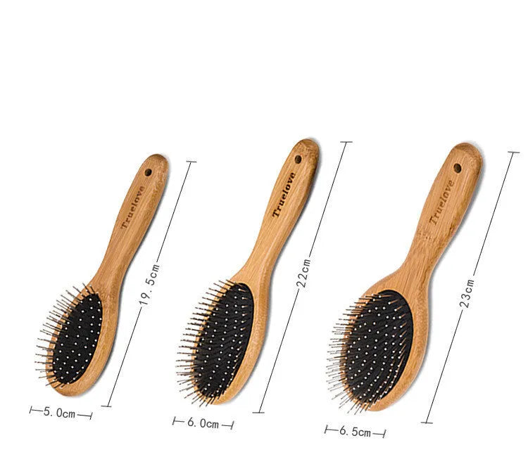 Medium pet deshedding comb with bamboo handle and stainless steel needles in original bamboo colour on a flat surface