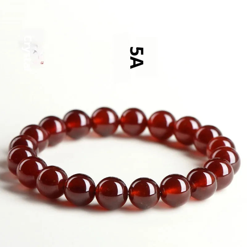 Natural orange red garnet crystal bracelet with ruyi motif in retro unisex design