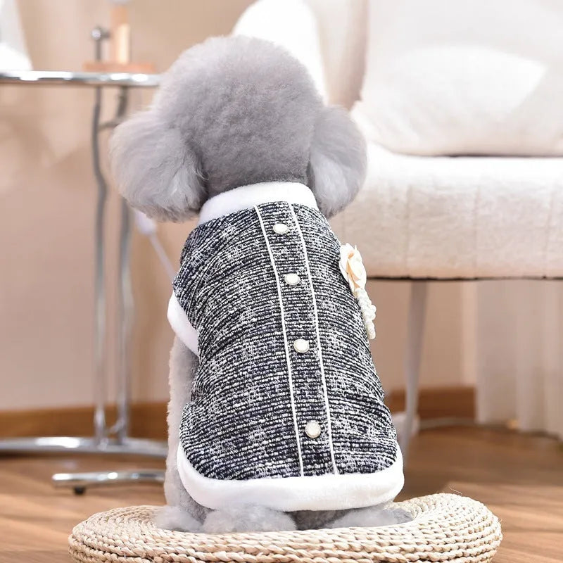 Black or purple sausage-themed cat jacket with Velcro fastening on a small feline
