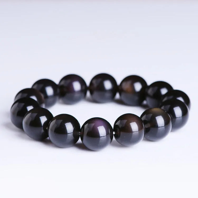 Polished geometric crystal bracelet with ice stone beads in various sizes on wrist