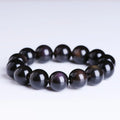 Polished geometric crystal bracelet with ice stone beads in various sizes on wrist