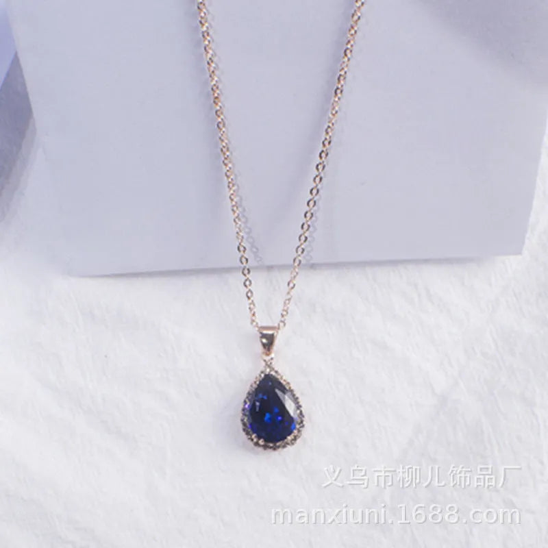 Women's drop-shaped pendant necklace with rhinestone geometric pattern in pink electroplated finish