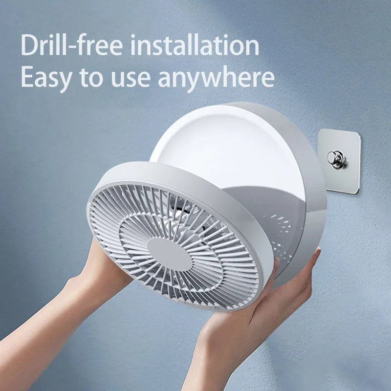White portable folding fan with remote control on desk showing night light and adjustable angle