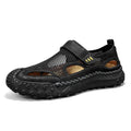 Men's black casual sandals with mesh upper and velcro straps on a rubber sole.