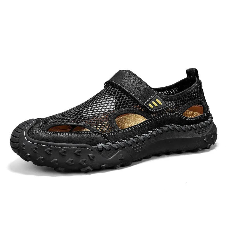 Men's black casual sandals with mesh upper and velcro straps on a rubber sole.