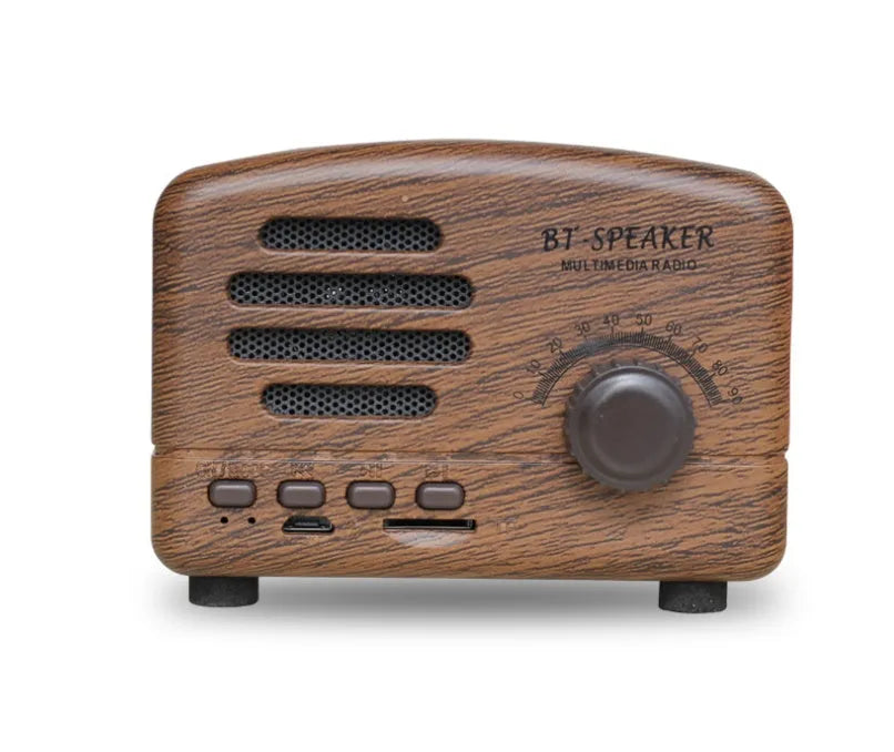 Compact vintage-style Bluetooth speaker in wood grain finish showing front grille and compact dimensions.