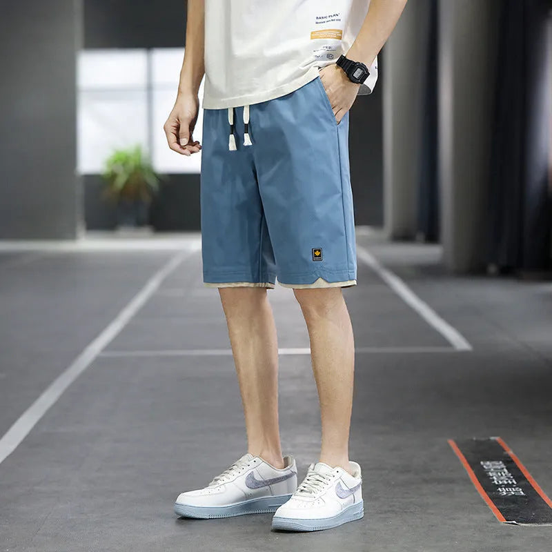 Straight loose casual beach shorts in micro-elastic polyester fabric available in multiple colours