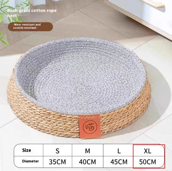 Natural rattan cat bed nest shown in a small size, suitable for a domestic cat.