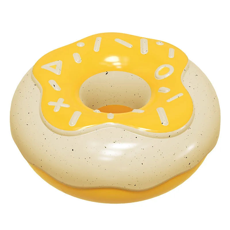 Pink TPR donut-shaped dog chew toy with raised dental cleaning nodules and squeaker inside