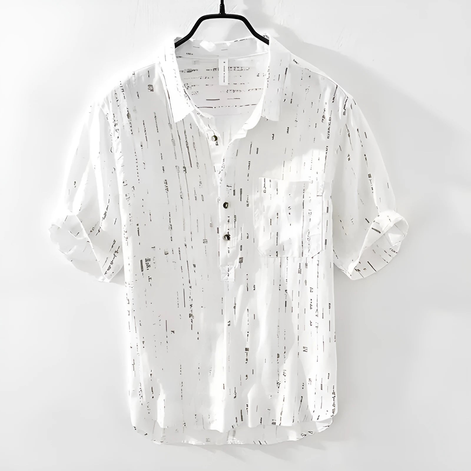 Men's black and white cardigan-style polo shirt with lapel collar and short sleeves