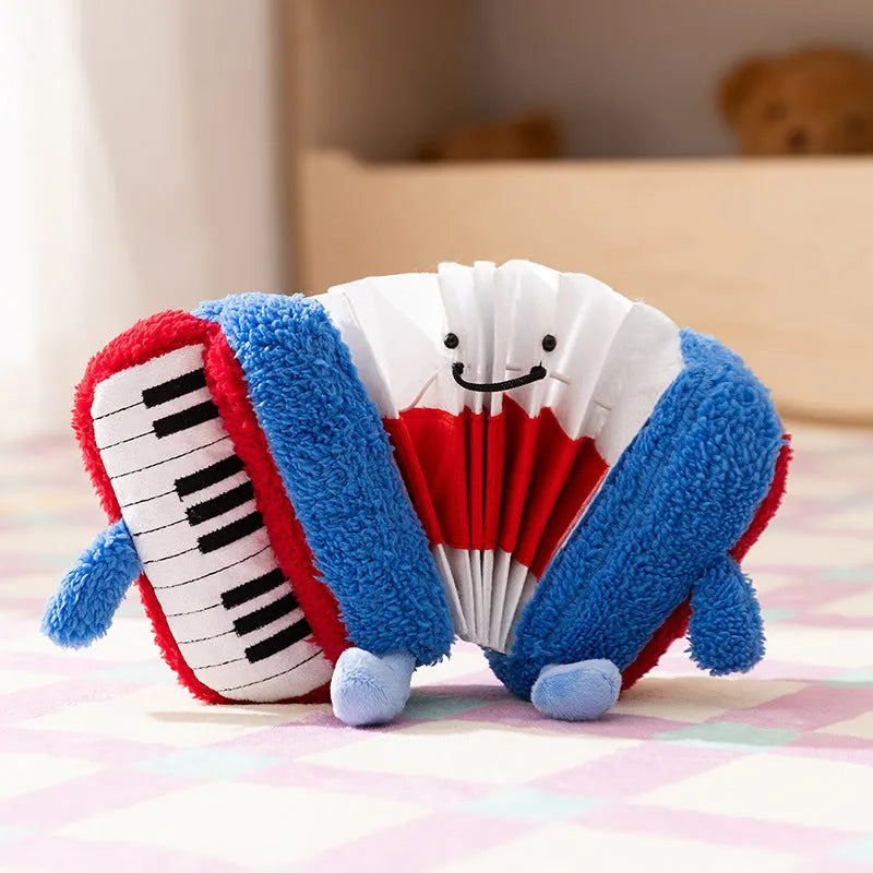 Blue accordion dog squeak toy with food hiding compartment on white background