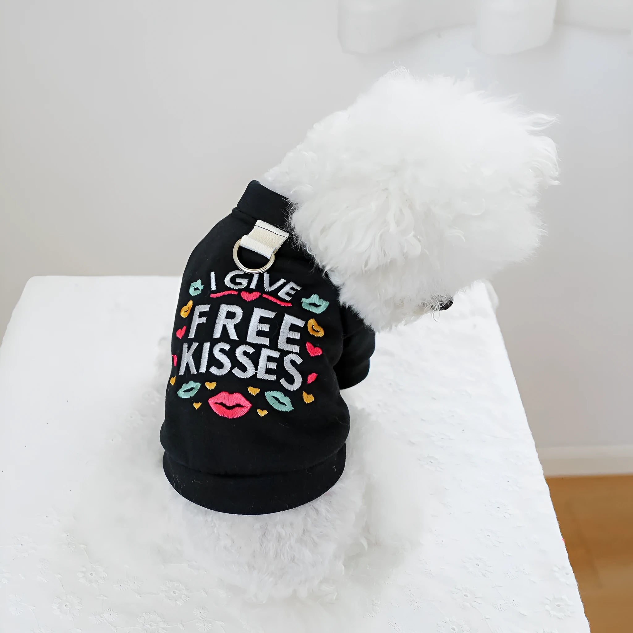Casual grey dog sweater with white kissing lips print, shown on a small dog.