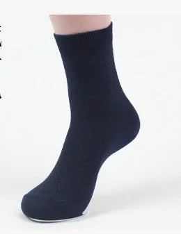 Men's bamboo fibre socks in a small square pattern, shown in navy blue colour.