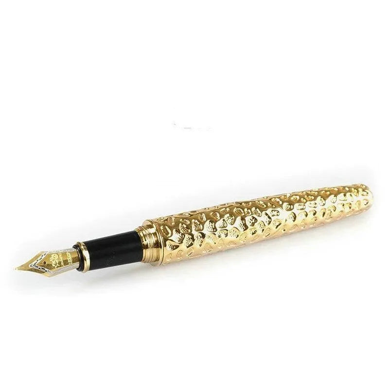 Metal embossed pen for business gifts in Ancient Silver or Gold finish on white background.