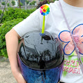 Silicone sunflower helmet decoration with suction cup on a helmet, showing swinging design