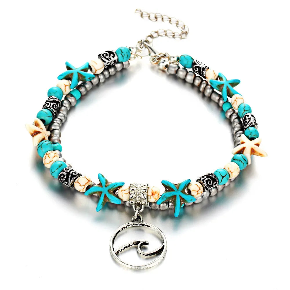 Green blue starfish anklet leg chain with zinc alloy construction on a beach setting