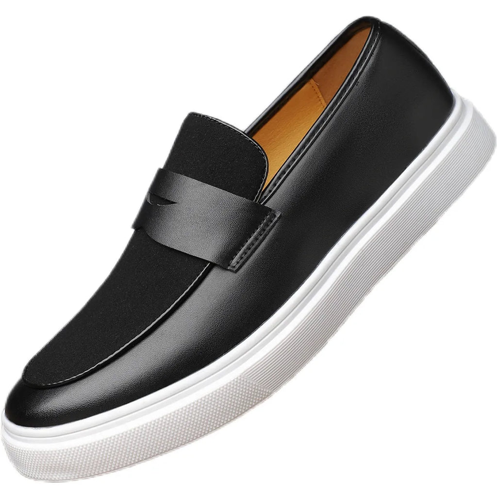 Men's black casual slip-on loafers with a tassel detail on the upper.