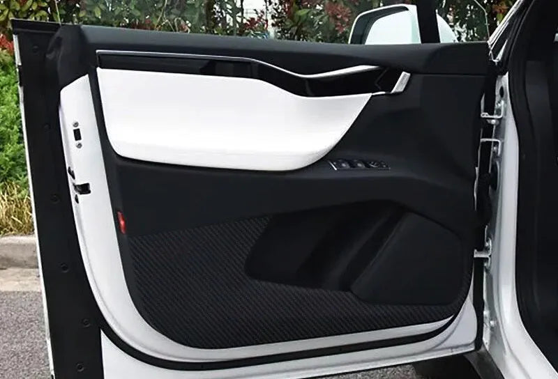 4-piece clear protective film kit for Tesla Model S interior car doors.